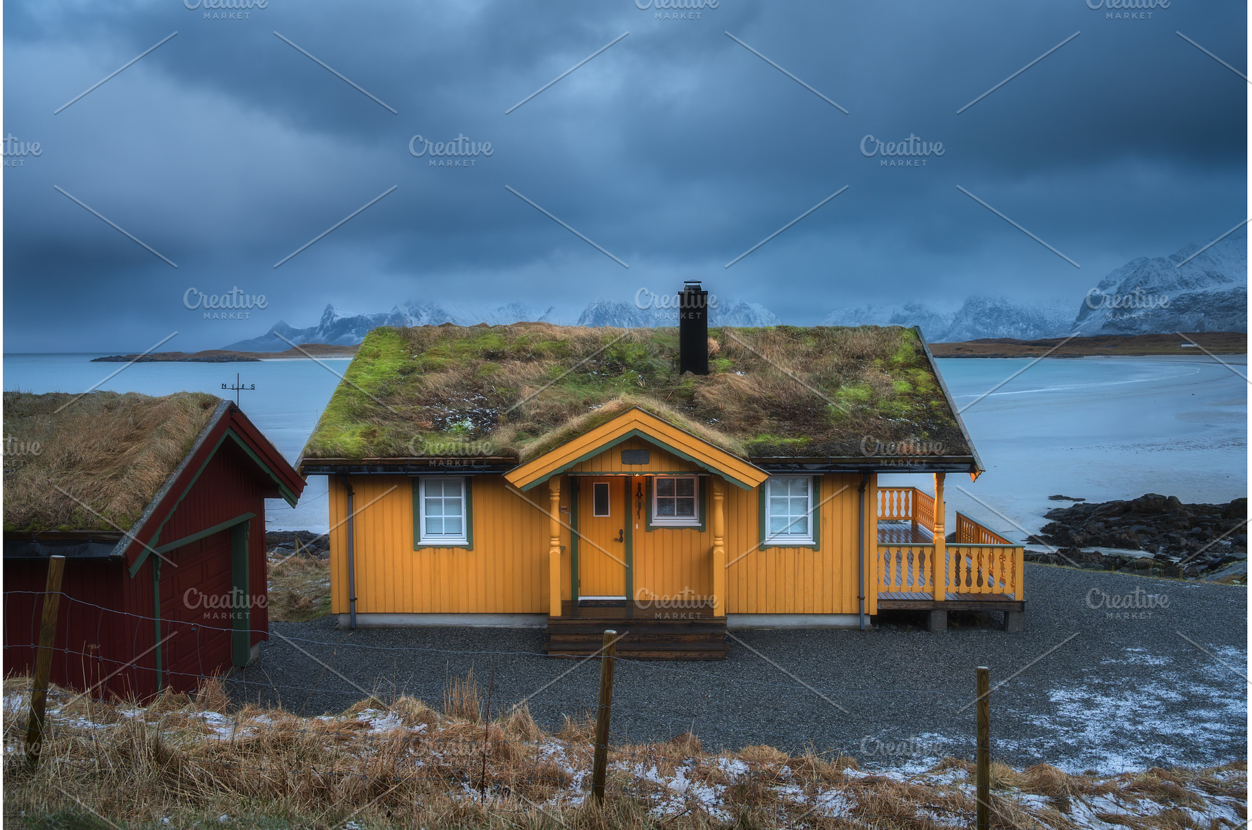 Traditional yellow rorbu with grass, an Architecture Photo by den-belitsky