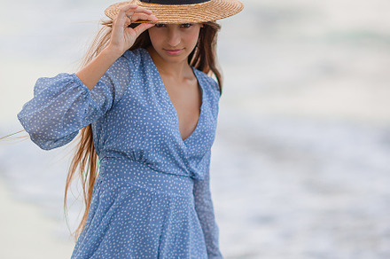 Beautiful teenager girl on tropical seashore at sunset. Beautiful little girl i, a Person Photo by travnikovstudio