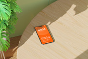 Saga Device Mockup on Table, a Device Mockup by orenjidesign (Thumbnail 9 of 13)
