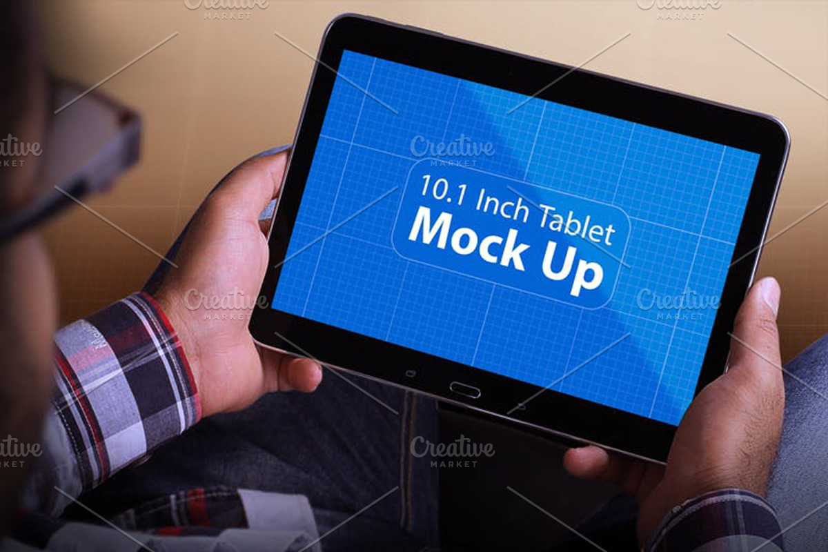 Tablet in Hand Mock Up, an iPad Mockup by Qaleb Studio (Photo 2 of 11)