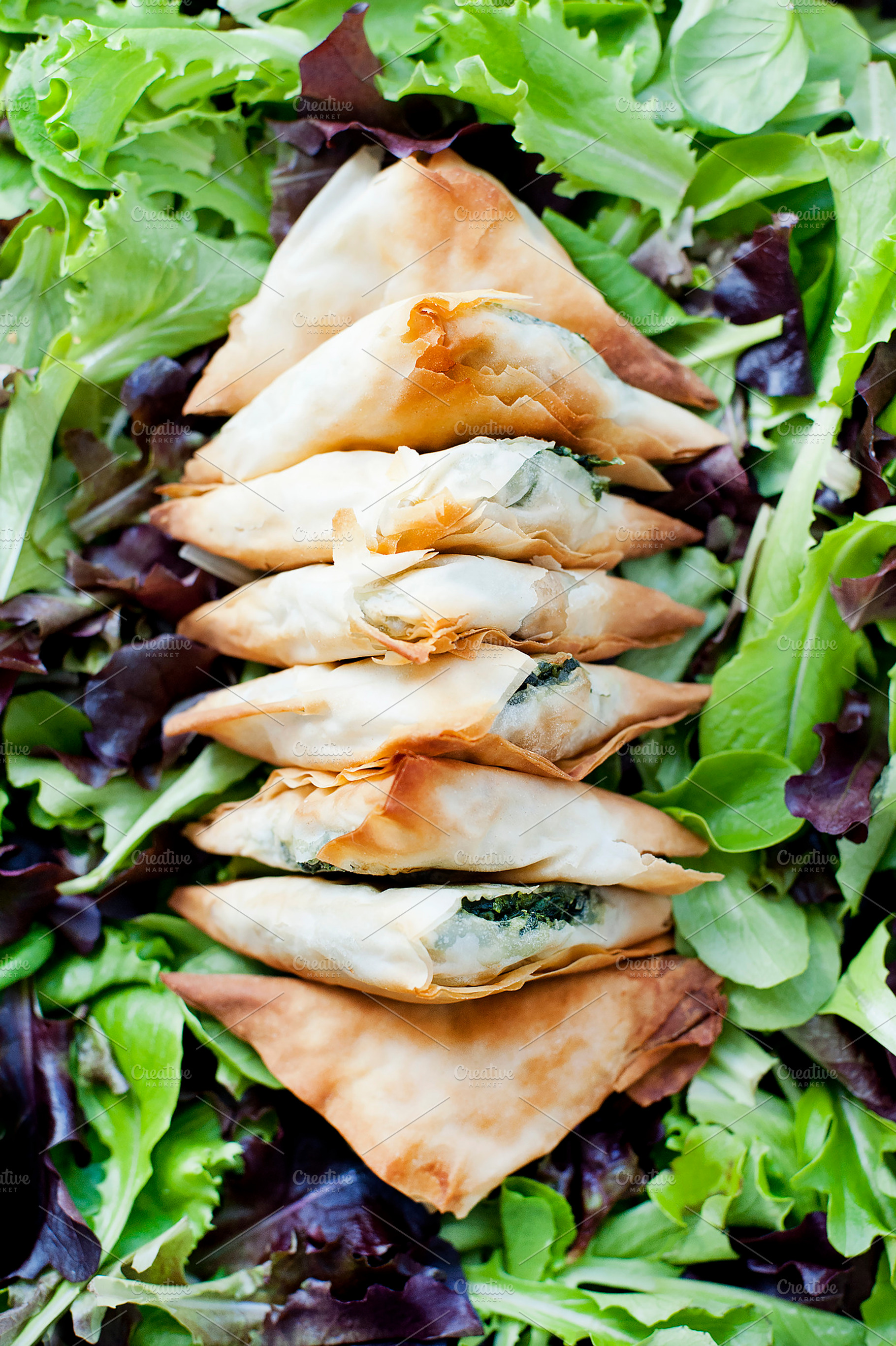 Spanakopita stock photo containing spanakopita and triangle, a Food & Drink Photo by ElanArt