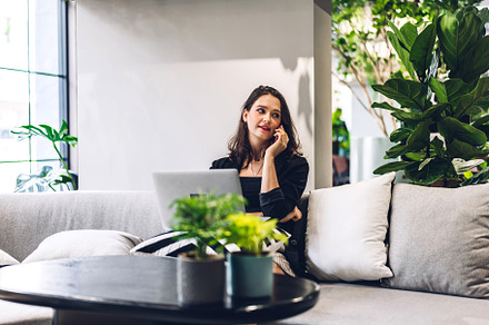 Portrait of smiling happy beautiful woman relax using technology, a Person Photo by Art_Photo