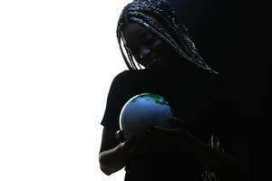 Planet care ecology protection woman earth globe, a Person Photo by Photo Drive Studio