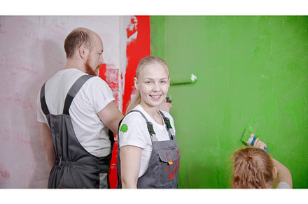 Family painting walls in the new, a Person Photo by Barcelona_dreams