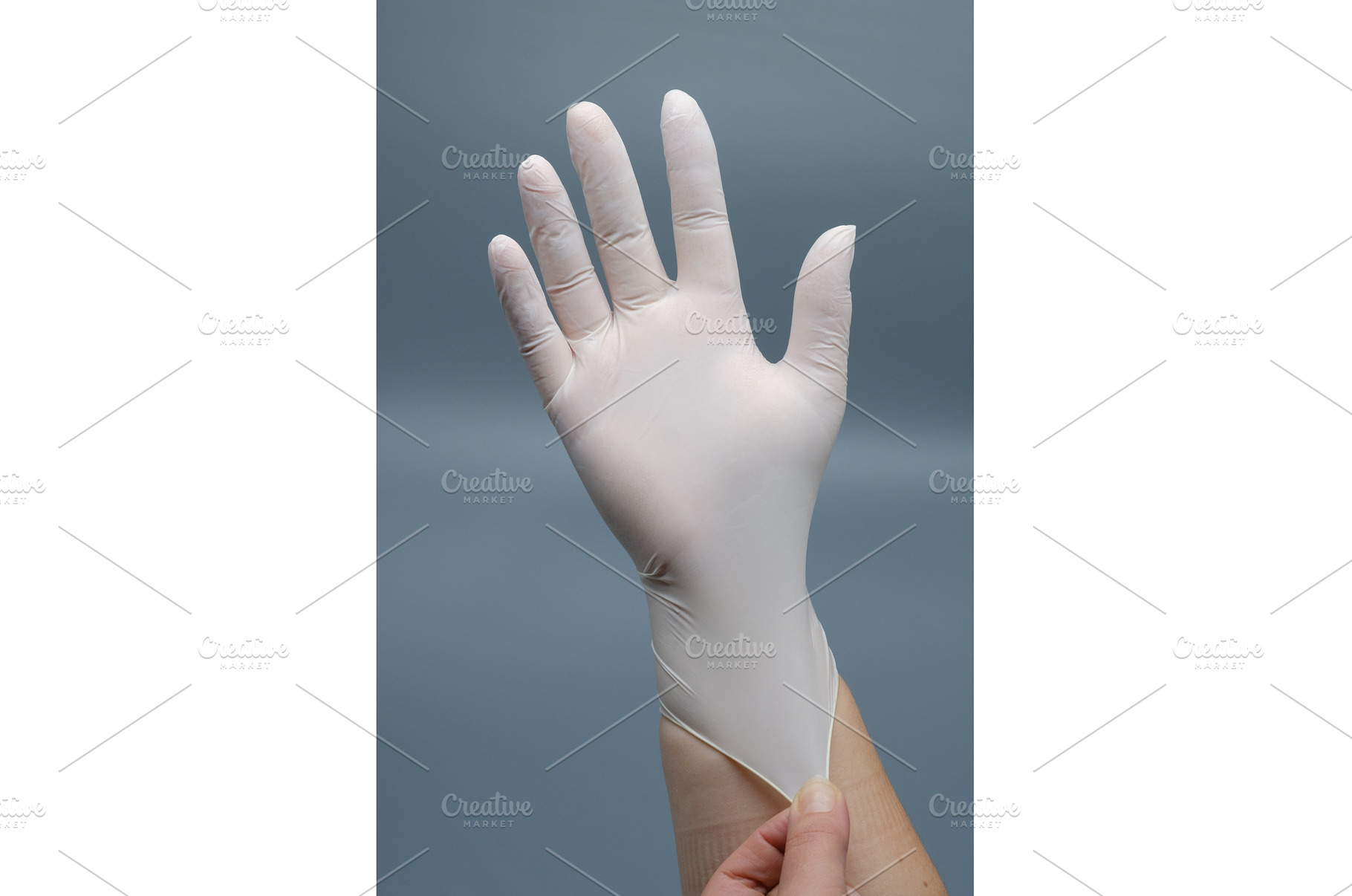 Hand putting on white nitrile, a Health & Medical Photo by Rohan Photography