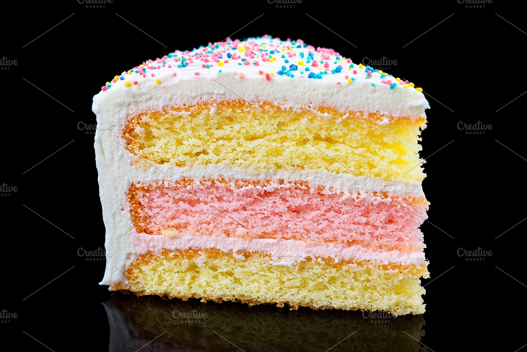 Delicious piece of cake with frosting cream, a Food & Drink Photo by AlyaAnd