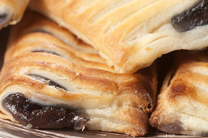 Small strudel cake with blueberry featuring cake, pie, and strudel