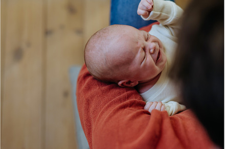 Close-up of father cudddling his, a Person Photo by HalfPoint