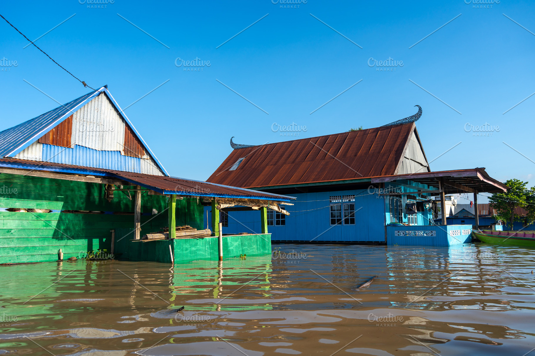 Traditional Bugis floating houses on Lake Tempe, Sulawesi, Indon, an Architecture Photo by GoodGoods