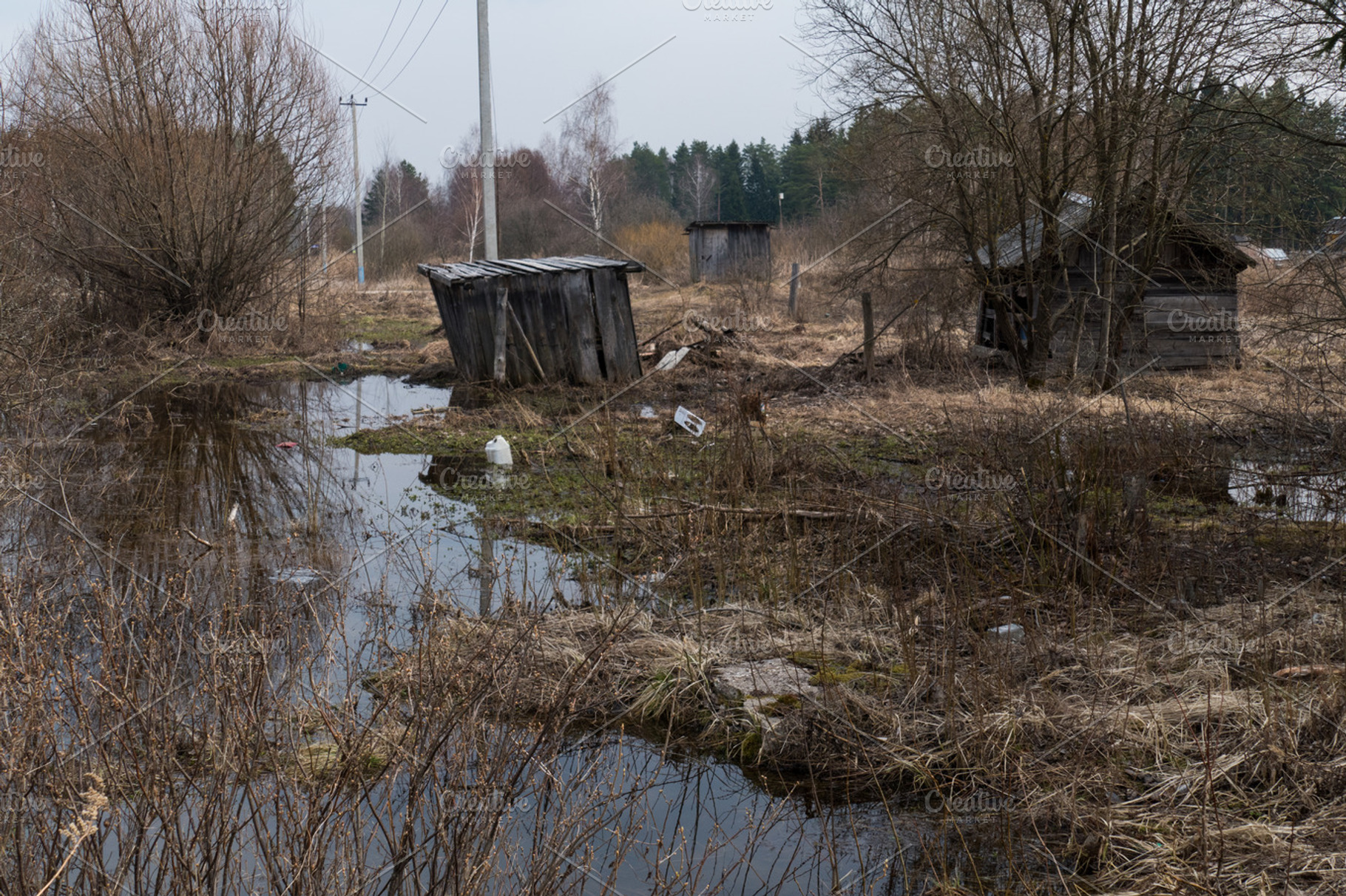 Old poor village and spring flooding stock photo containing landscape and, an Architecture Photo by KAA