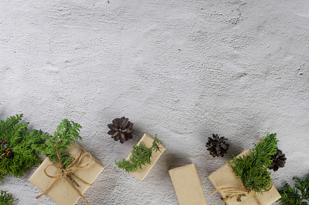 Christmas still life. Xmas Gift in craft paper with pine cones,, a Holiday Photo by vimart