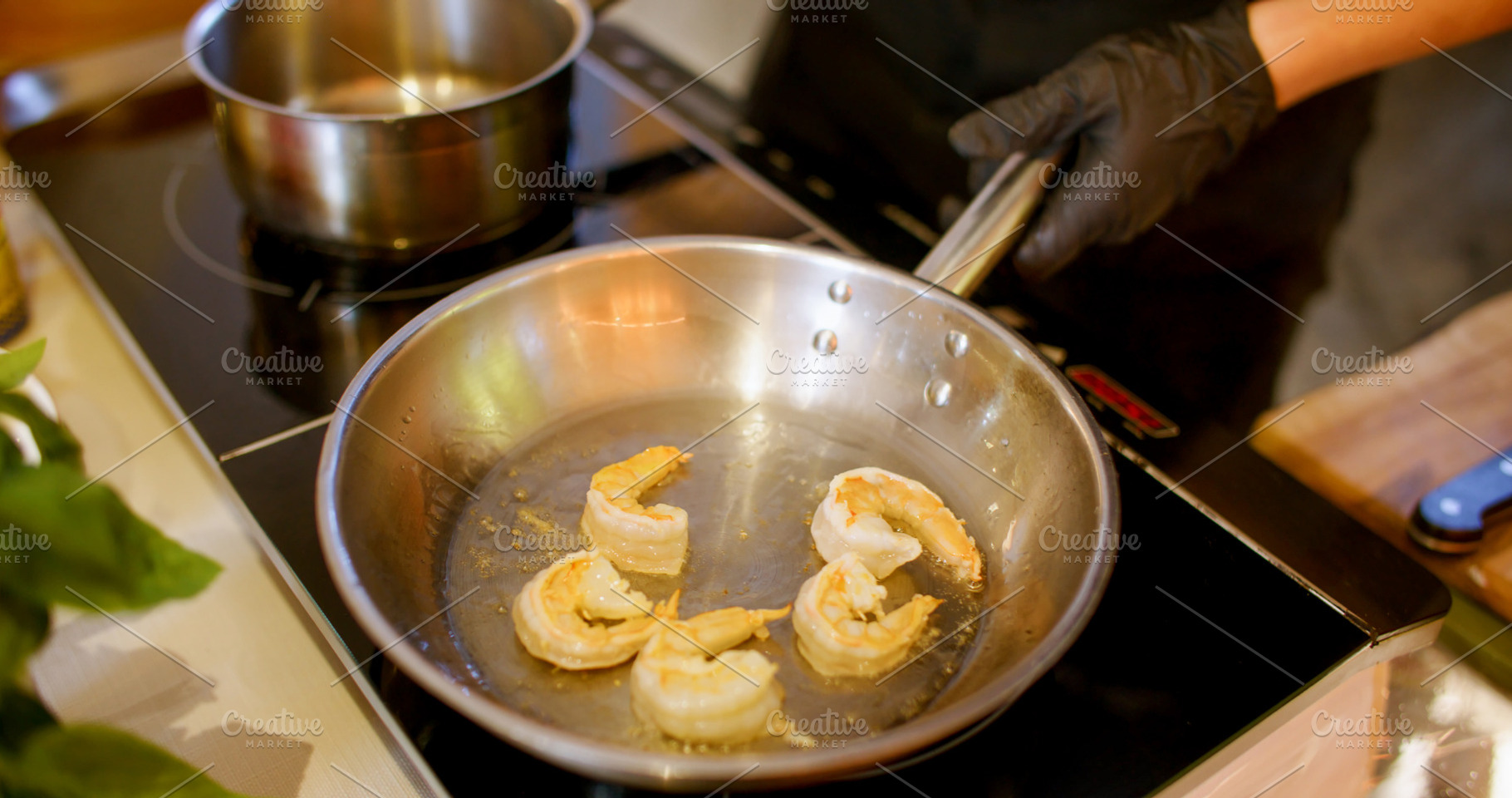 Cooking shrimp frying meal chef pan hand kitchen, a Food & Drink Photo by Photo Drive Studio