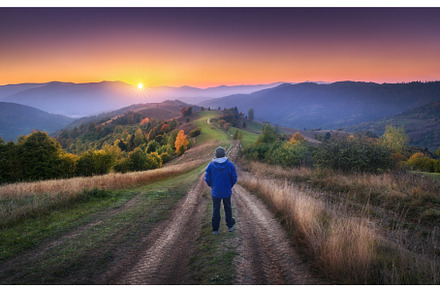 Man on the rural dirt road on the