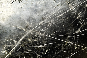 Scratched Metallic Surface with Industrial Grunge Texture, a Background Photo by Photostock