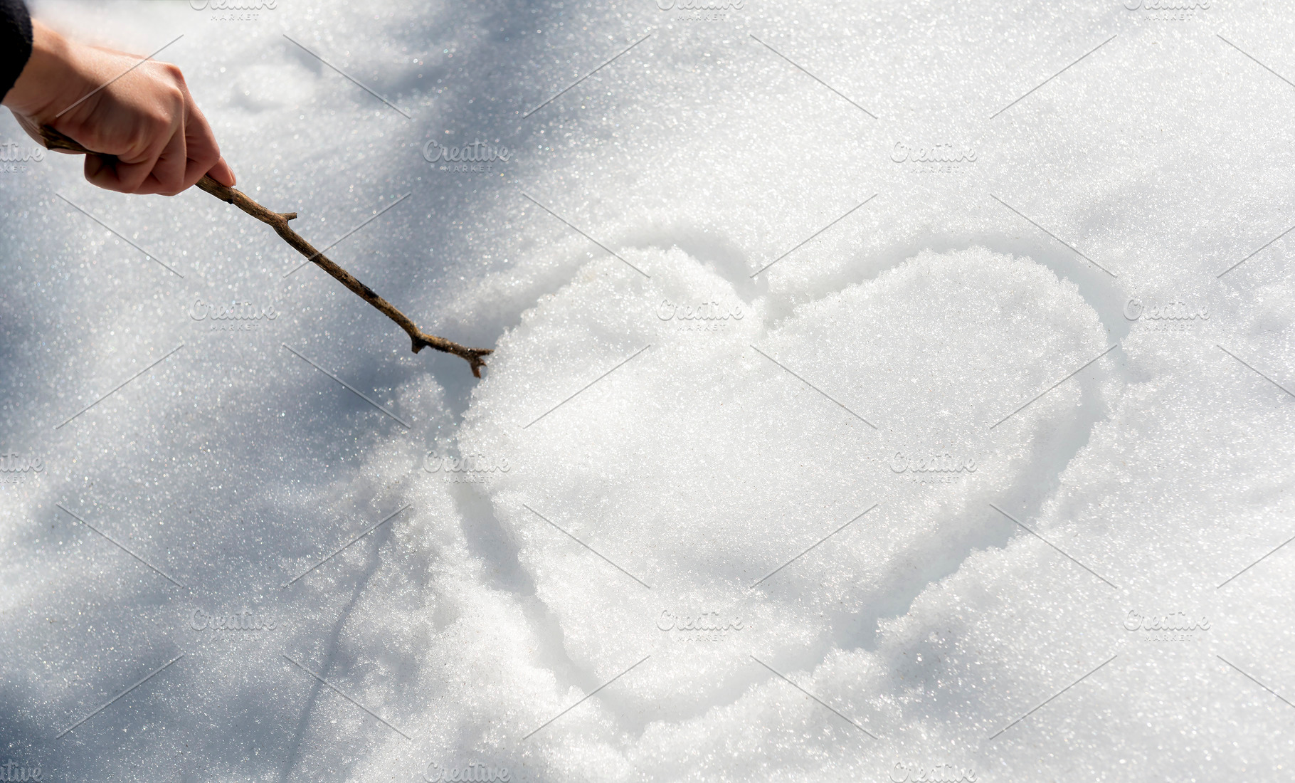Love Heart In Snow, a Person Photo by THP Creative