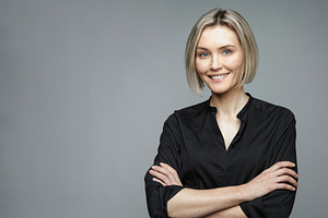 Beautiful middleaged woman on a stock photo containing woman and black