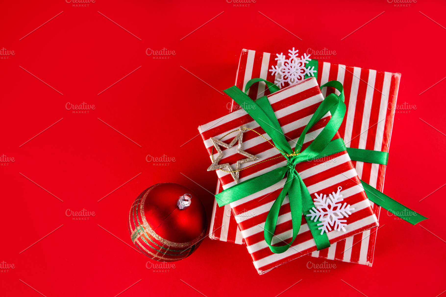 Bright high-colored background with Christmas boxes, festive bau, a Holiday Photo by Rimma