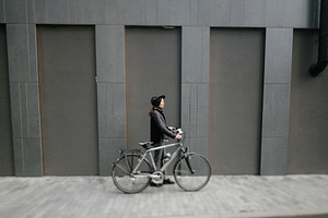 Woman riding a bicycle in a city