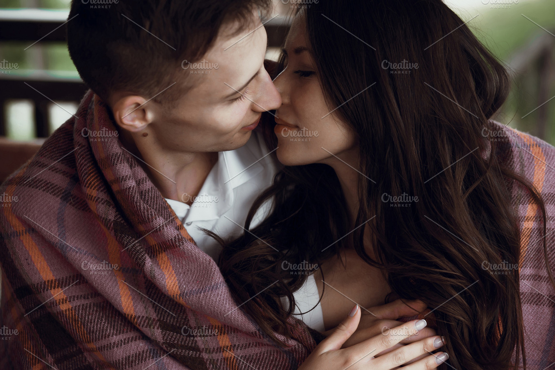 Kissing couple containing tender, kiss, and brunette, a Holiday Photo by IvashStudio