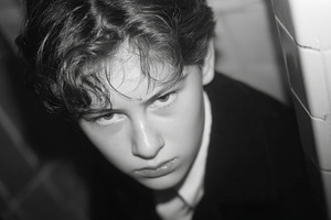 Black and white portrait of a person with an intense expression, a Photo by AS photostudio