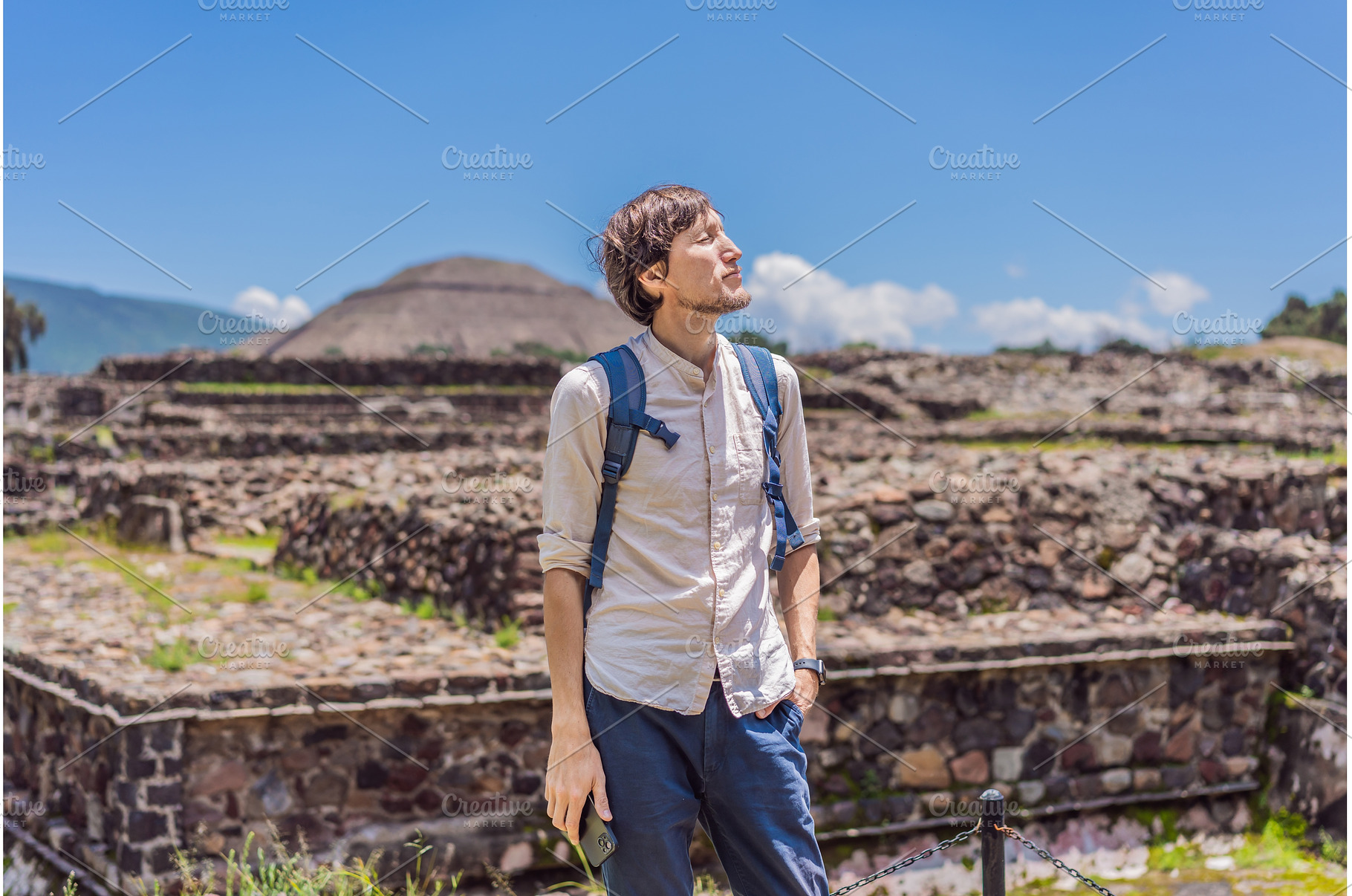 Male tourist posing in front of the, a Nature Photo by Elizaveta Galitskaya