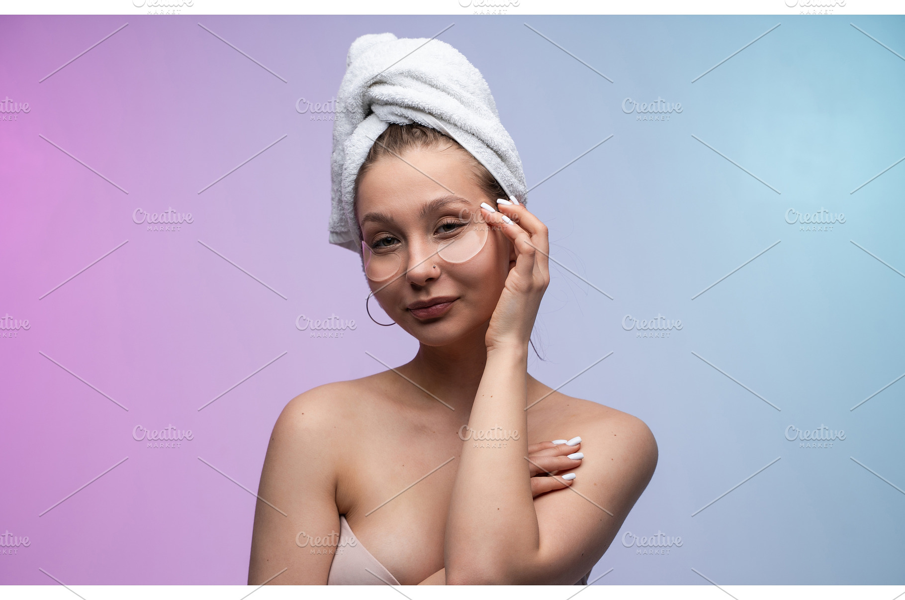 Woman applying under eye patches for, a Person Photo by volodymyrshtun13795
