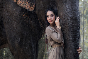 Asian woman and elephant