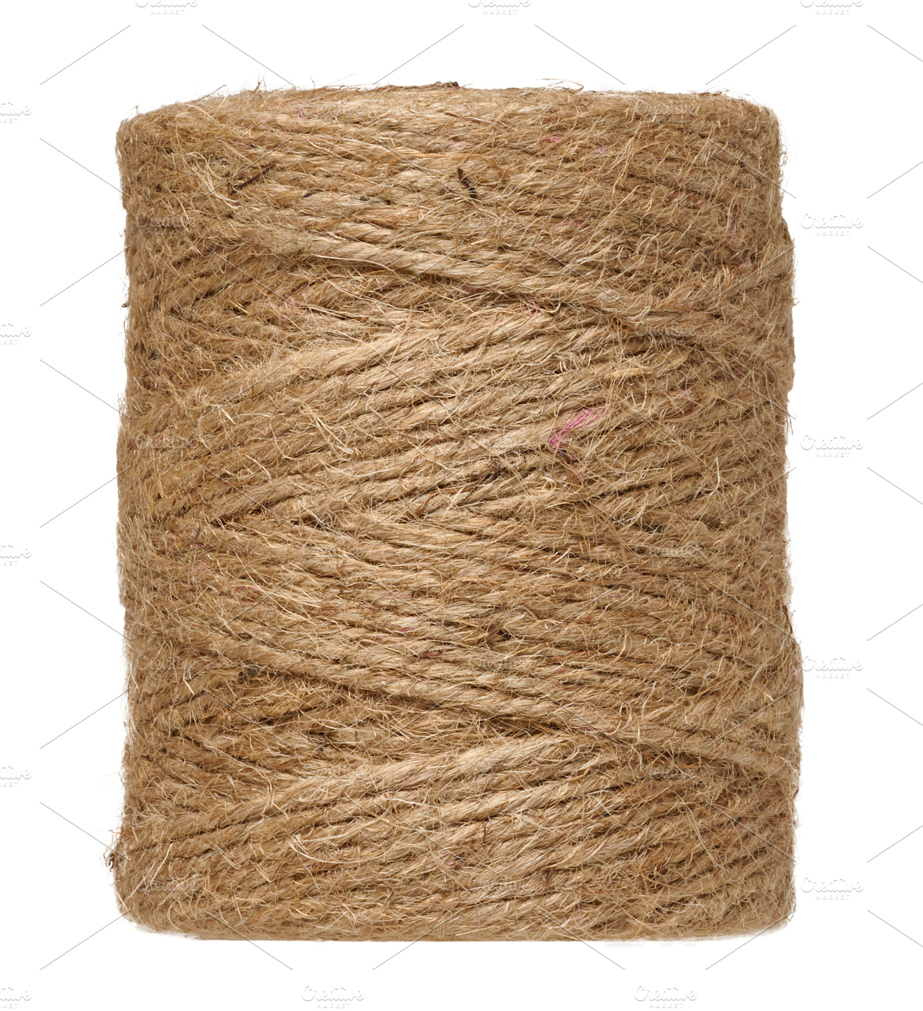 Roll of natural jute rope for packaging on isolated background, an Industrial Photo by ndanko