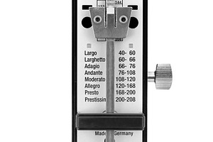 Modern metronome isolated, a Photo by saiko3p