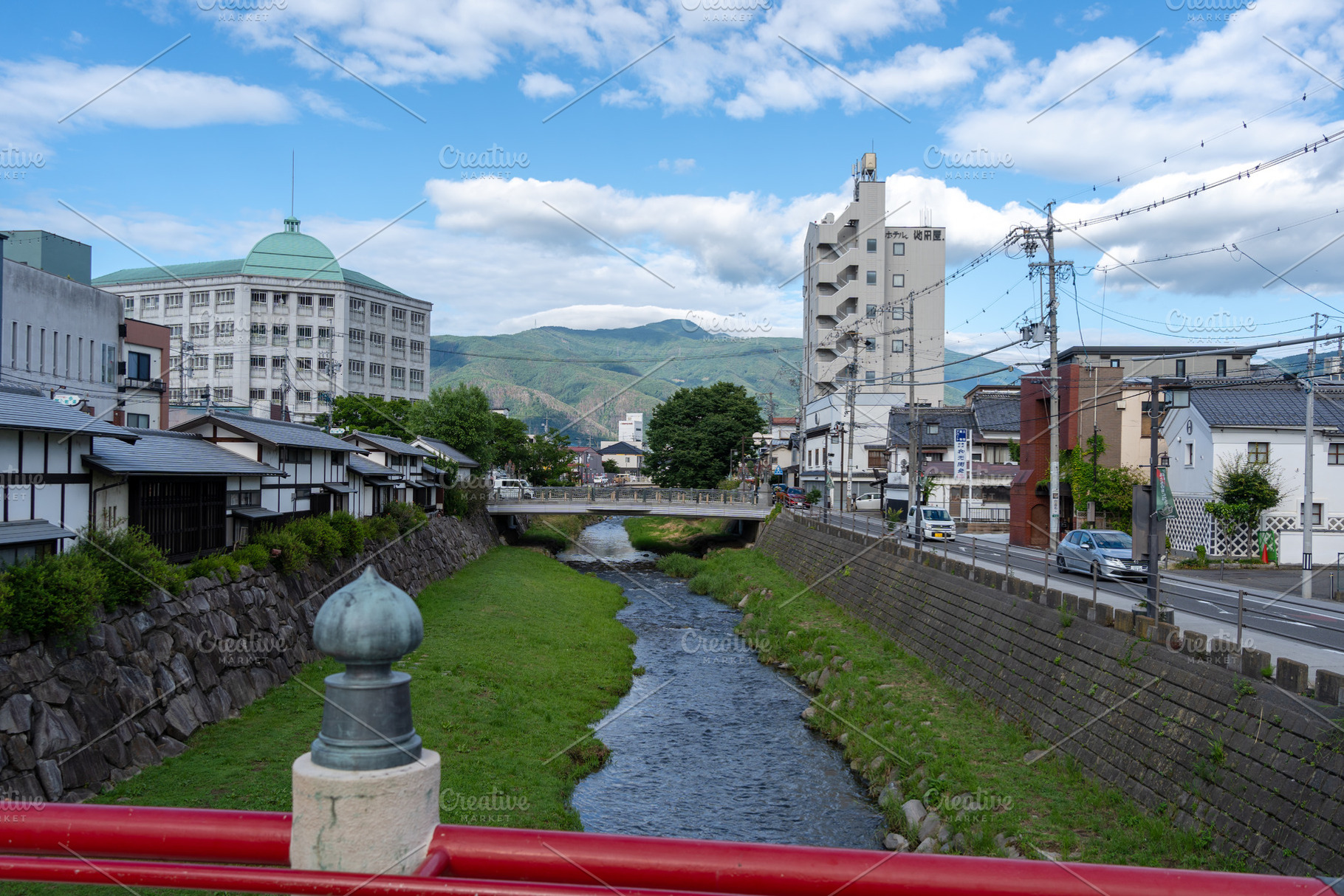 View of the Metoba River from a bridge in Matsumoto, an Architecture Photo by GoodGoods