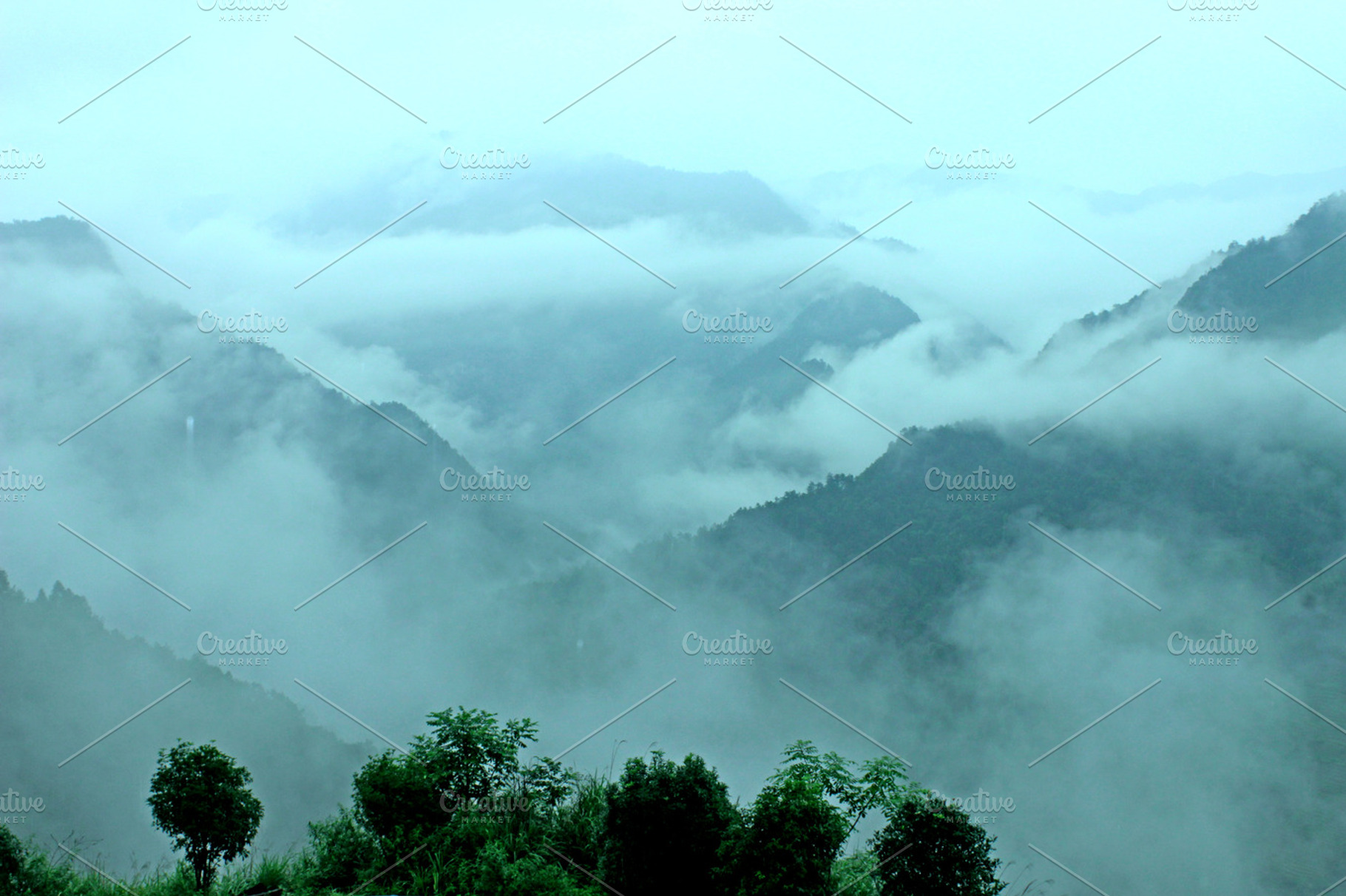Foggy mountains featuring fog, mountains, and hills, an Abstract Photo by Corner Croft Mockups