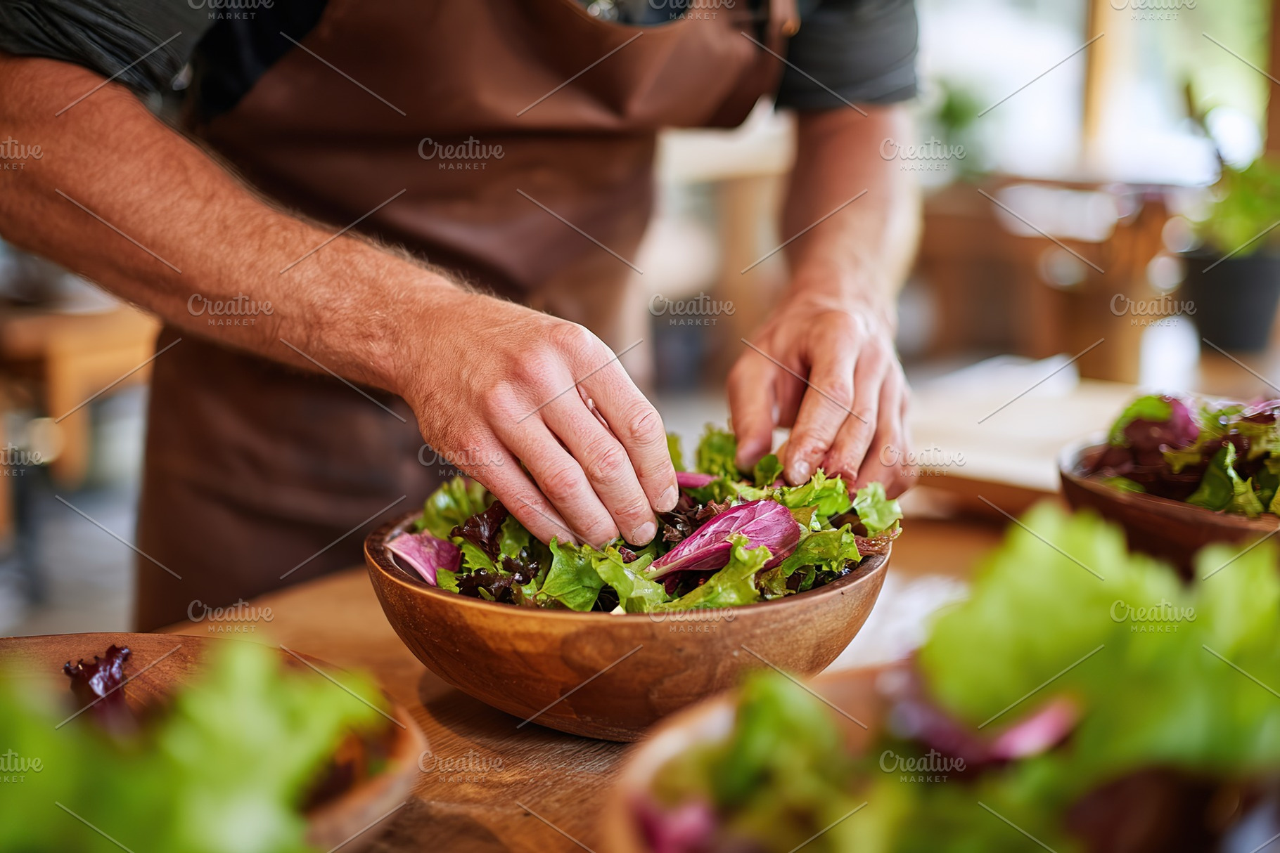 Preparing a fresh seasonal salad with garden greens for a communal meal in a co, a Photo by AlyaAnd