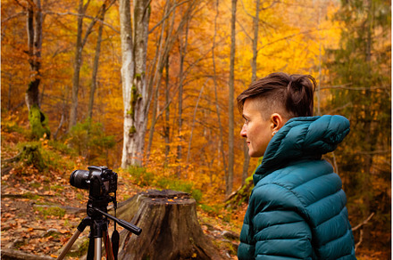 Travel photographer use camera and, a Nature Photo by oksix