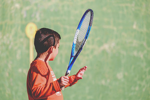 Young boy playing tennis stock photo containing tennis and game