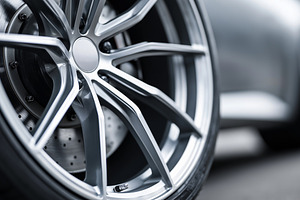 Close up of a modern car wheel with, a Transportation Photo by MistyDay