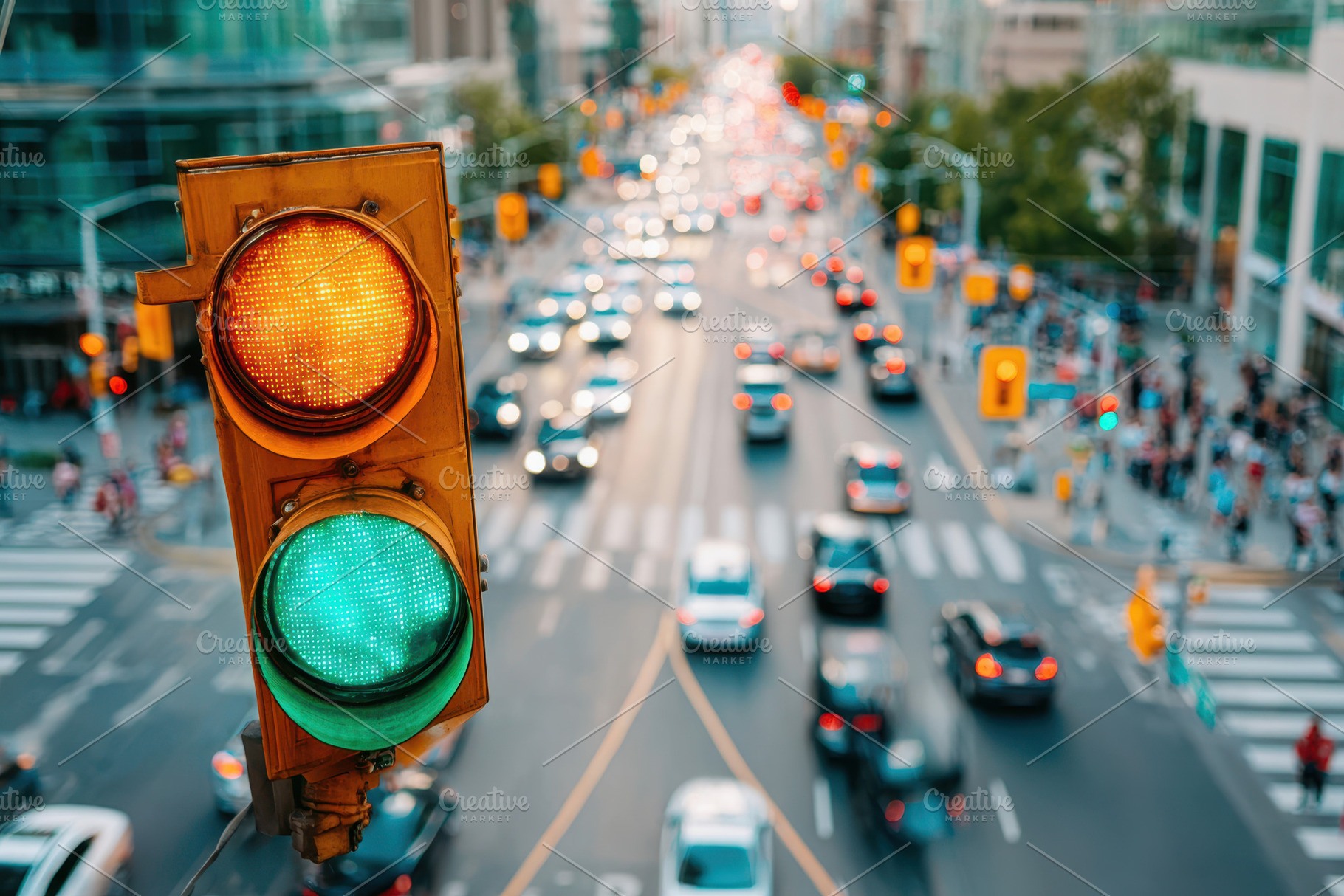 Green traffic light in a busy urban setting, a Transportation Photo by AlyaAnd
