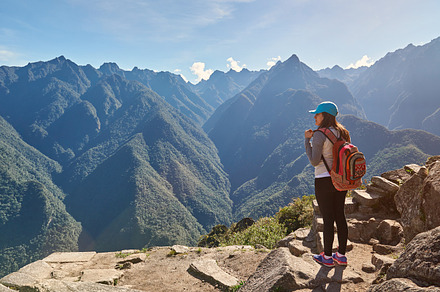 Woman with backpack containing woman, peak, and above, a Person Photo by PixieMe