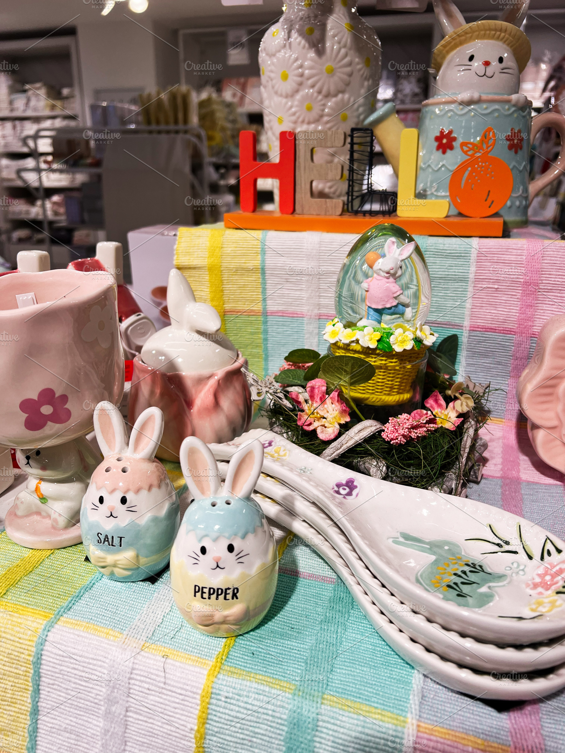 Easter themed decor featuring bunny salt and pepper shakers on c, a Photo by AS photostudio