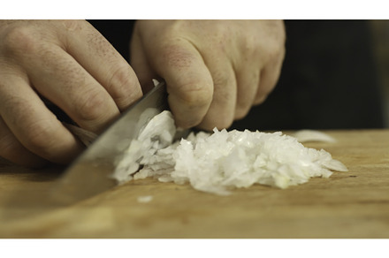 Close-up of man hands cutting white, a Food & Drink Photo by Media Whale Stock