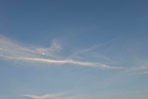 Photo of cirrus clouds with the moon, a Background Photo by Pray Art Design Studio