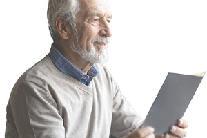 Senior man watching holding a paper isolated photo, a Person Photo by DanFLCreativo