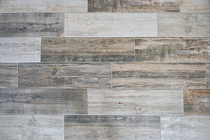 Flooring covered with imitation wood tiles in brown tones, a Background Photo by Davizro's Market