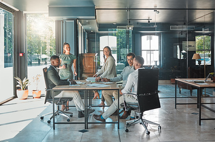 Corporate business meeting, team collaboration and strategy planning in a startup company. Office workers, diversity employees and workforce having discussion, brainstorm and speaking in an agency, a Photo by Peopleimages.com