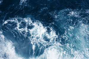 Top view on blue ocean waves