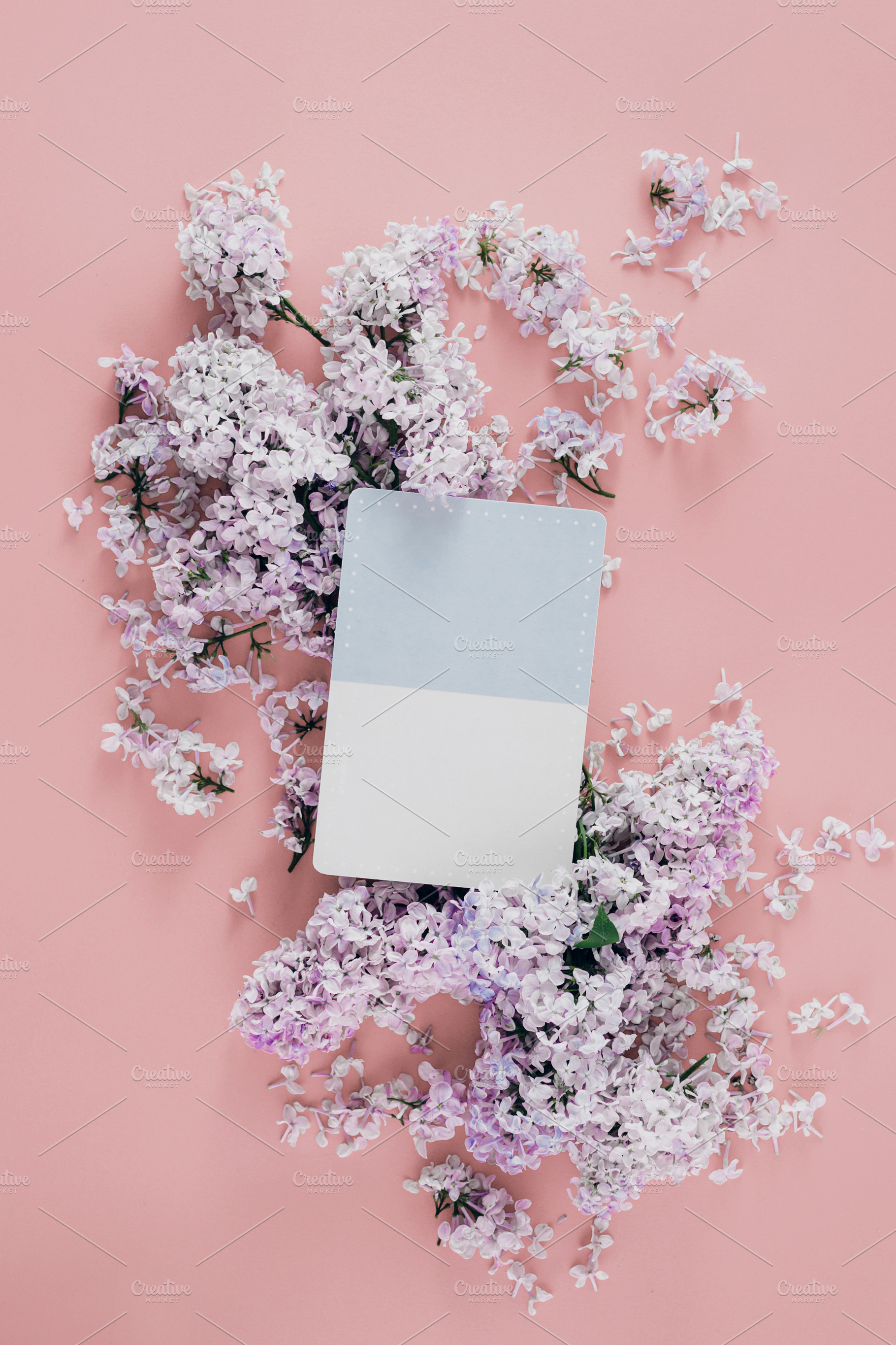 Postcard with lilac flowers flat lay, an Abstract Photo by KucherPhoto