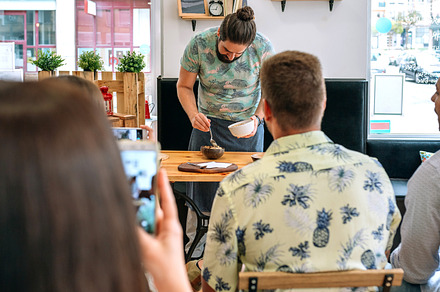 Young cook giving a cooking workshop, a Person Photo by davidpereiras
