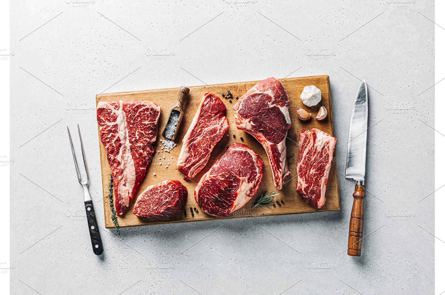Angus prime meat steaks set on, a Food & Drink Photo by Sergey Kotenev