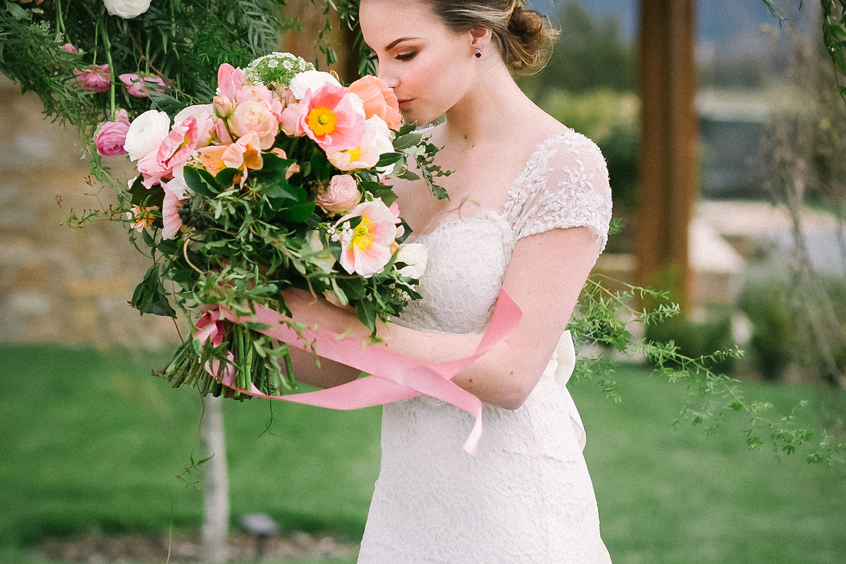 Wedding Bride with Spring Flowers, a Person Photo by Shae Estella Photo (Photo 1 of 2)