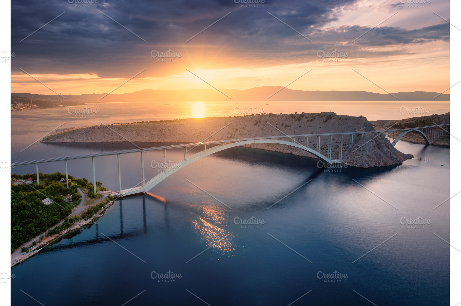Aerial view of bridge and blue sea, an Architecture Photo by den-belitsky