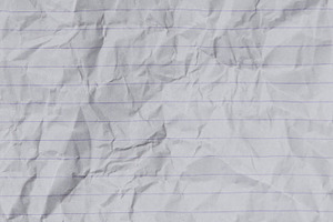 White crumpled lined paper